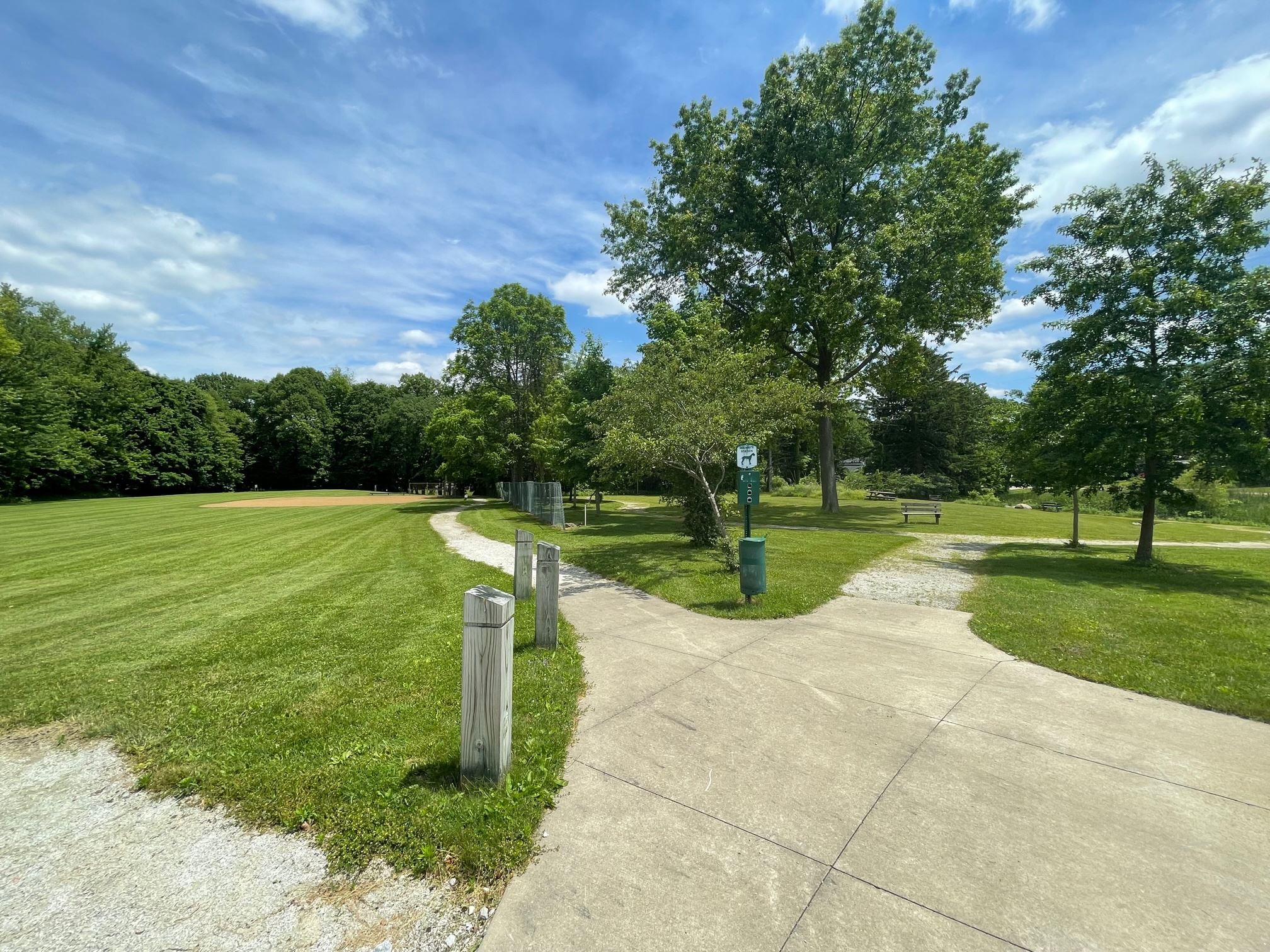 Field with trail and baseball diamond